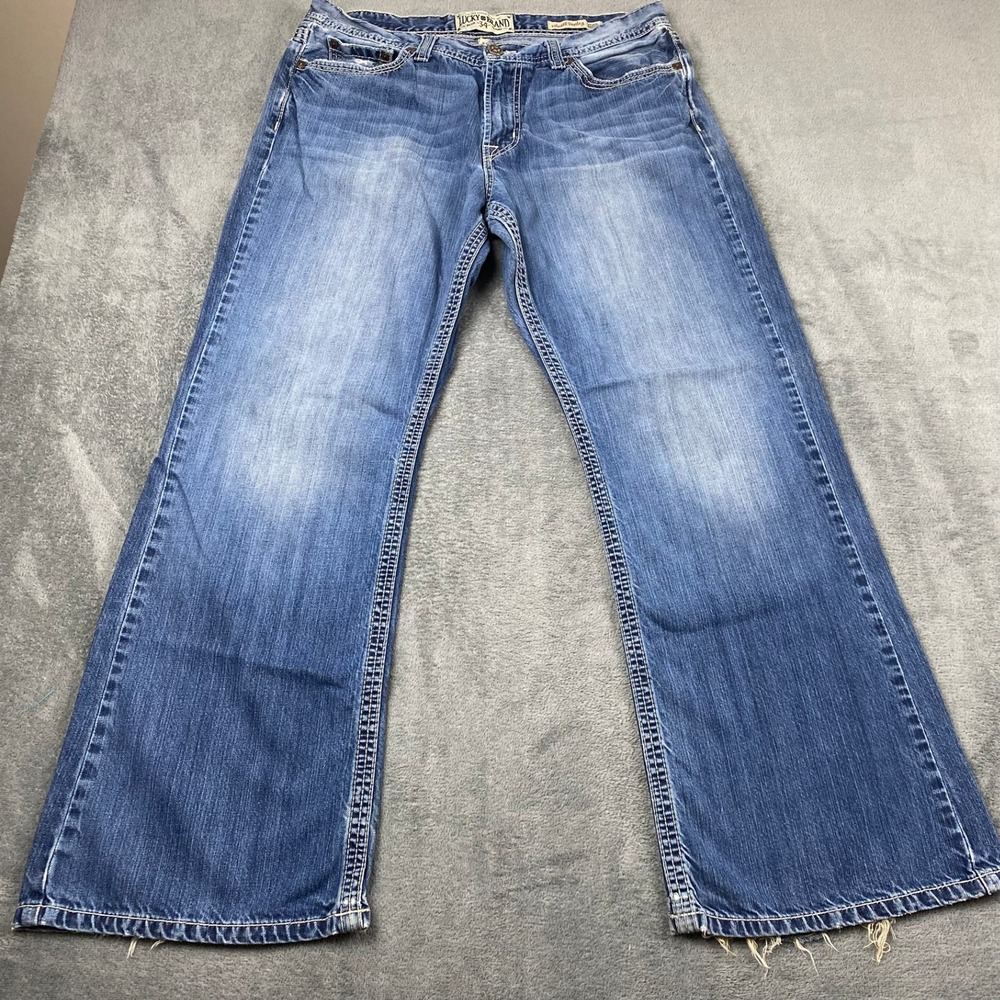 Lucky Brand Women 34 Relaxed Bootleg Jeans Blue Low Rise Distressed Frayed Hem